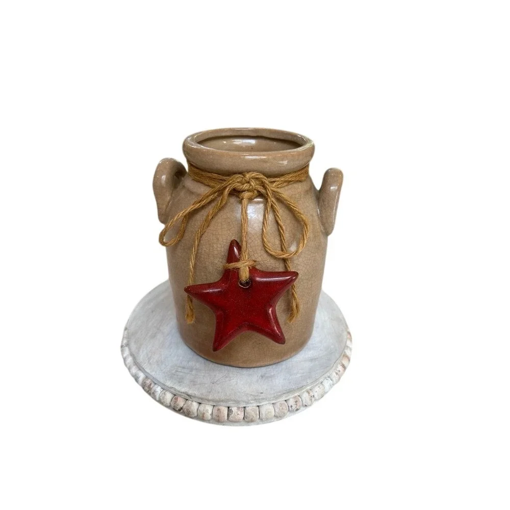 Farm house brown glazed ceramic jug with ceramic star.‎